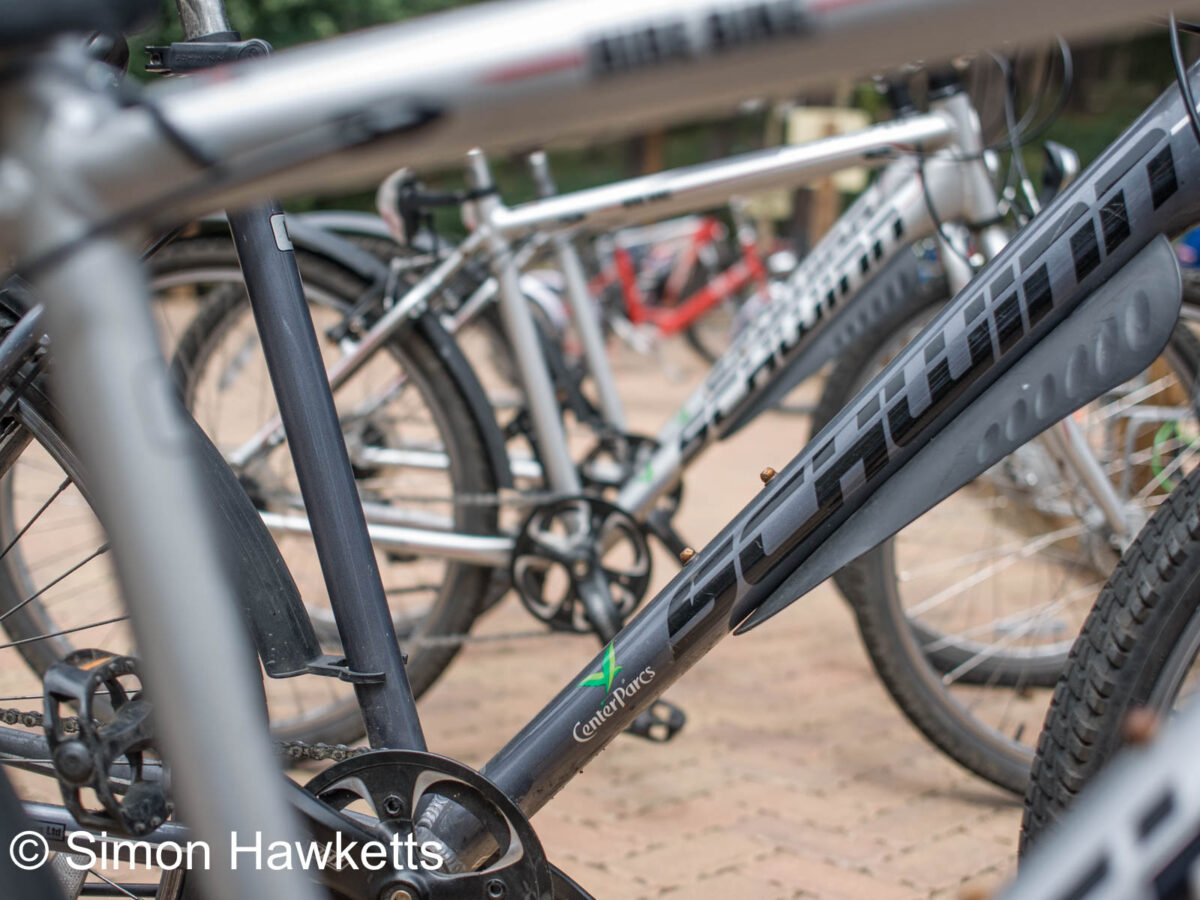 A triangle made with the component parts of a bike