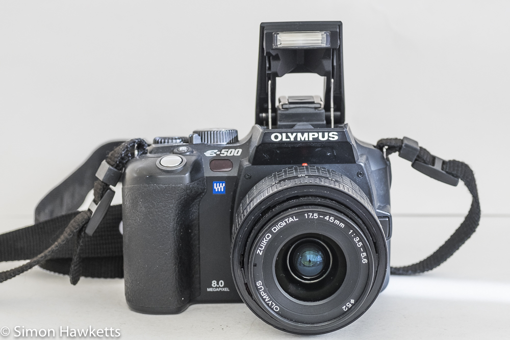 Olympus E500 dslr - front view with flash raised